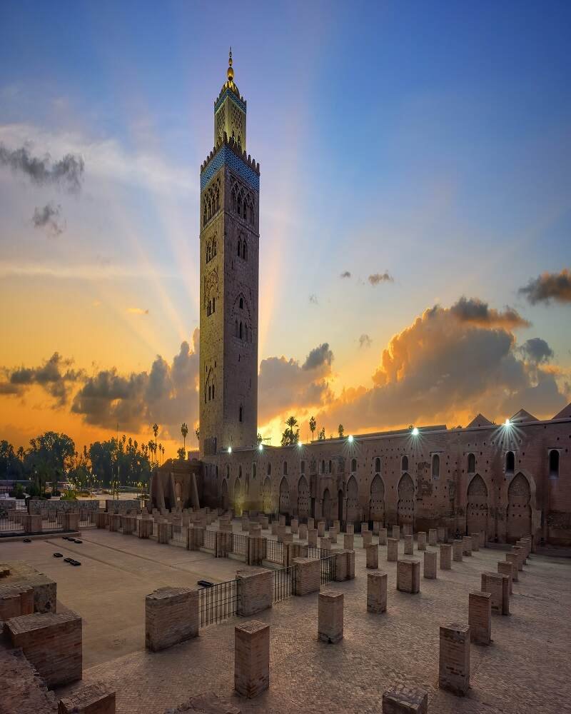 Sunset view overlooking the bustling food stalls and crowds in Jemaa el-Fnaa square Marrakech Morocco travel guide